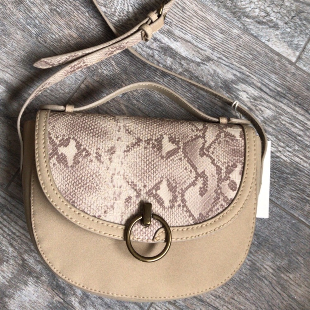 Skin cross body bag